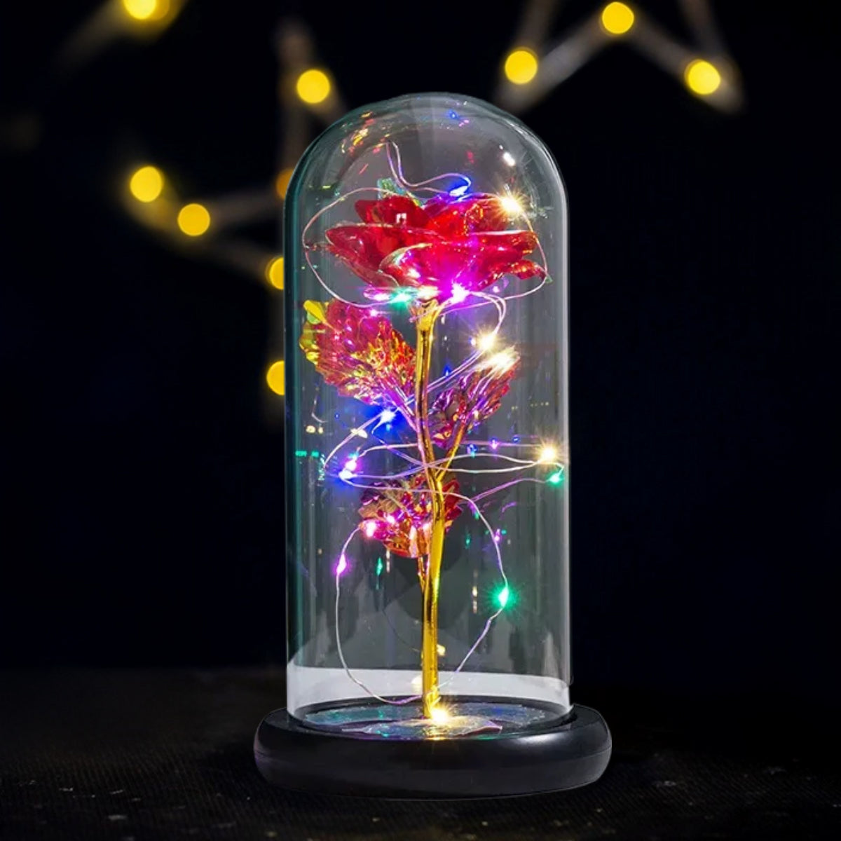 Glass cloche containing twin white roses illuminated by vibrant blue and purple LED lights, blurred neon cityscape background with bokeh effects
